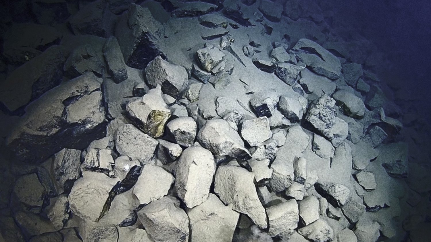  Chunky basaltic rocks seen on the seafloor, which Dawn aptly names the area “Flintstones quarry” 