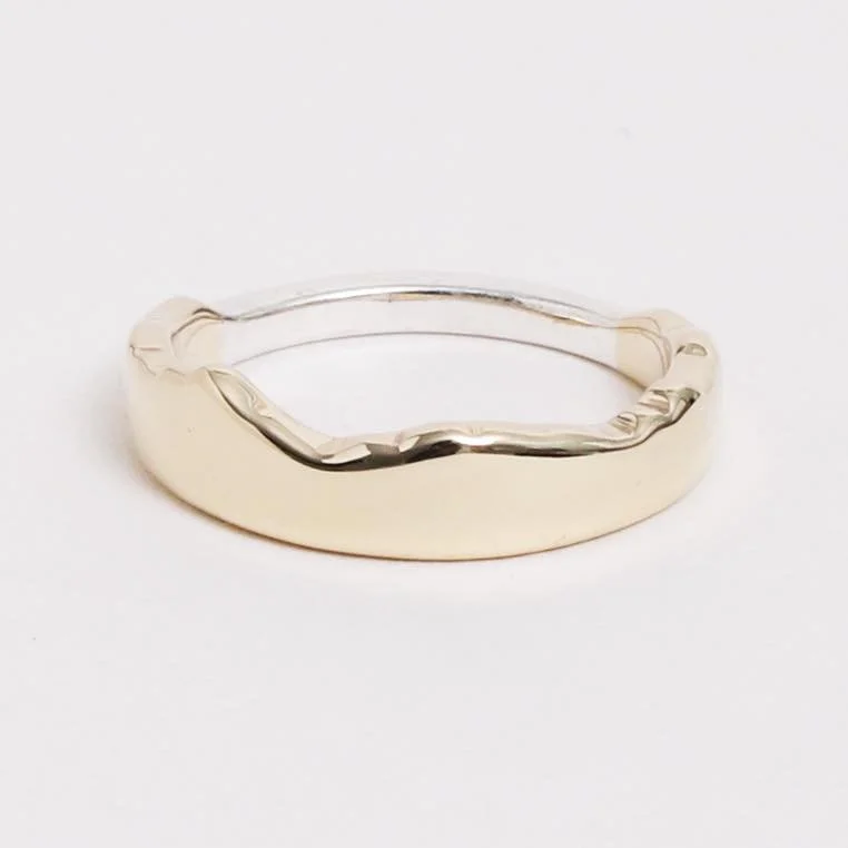 Part of the Mourne collection, this ring is shaped to show the exact outline of the Mourne Mountains in County Down, showcasing the entire silhouette from where the mountains sweep up from the sea.
It is made with the Mourne mountains in 9ct Yellow