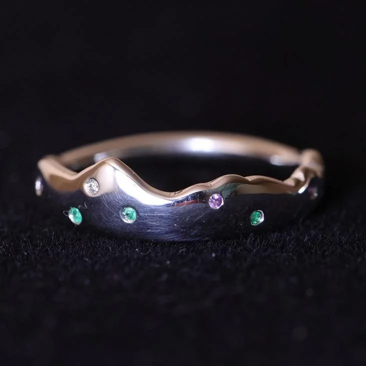 Another customers Mourne mountain ring; the Diamond represents the stars above the mountains, the Emerald represent the Emerald Isle I live on, and the Amethyst the blooming heather covering the Mourne Mountains. Order your today through my online sh