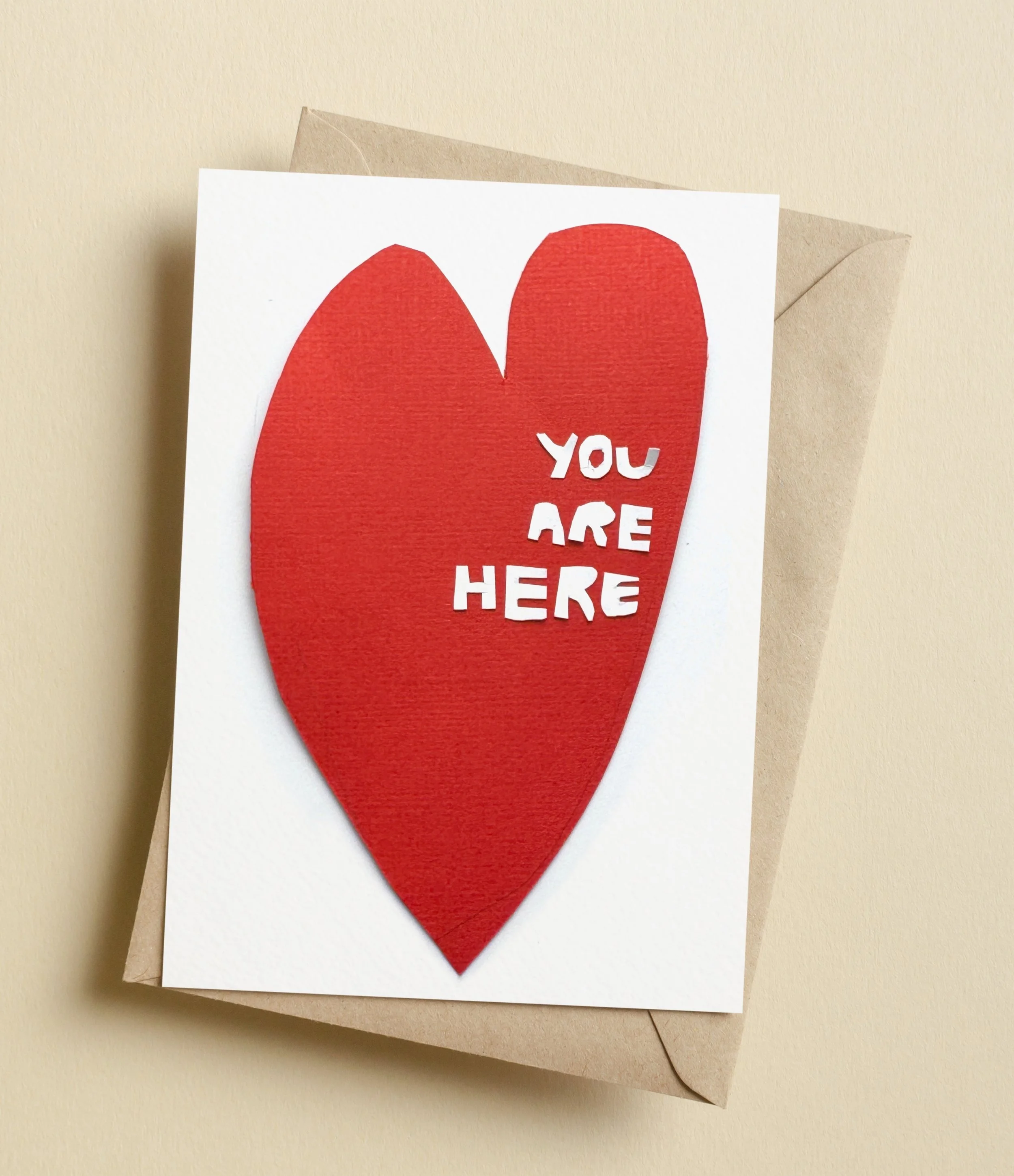 Hand-cut paper collage artwork with layered paper textures in soft colors, created by Veronika Timokhina.