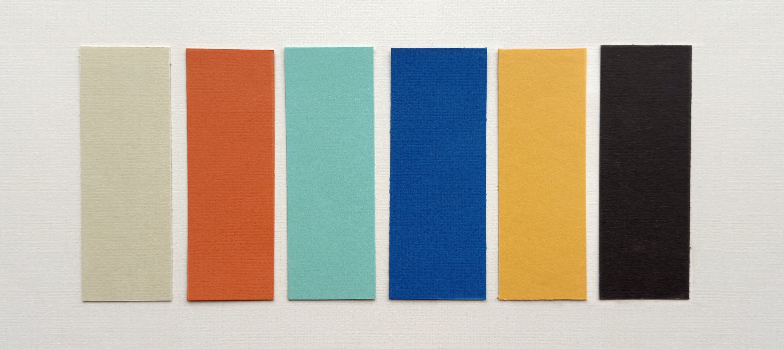 Hand-cut paper collage artwork by contemporary paper artist, featuring minimalist compositions made from layered colored paper