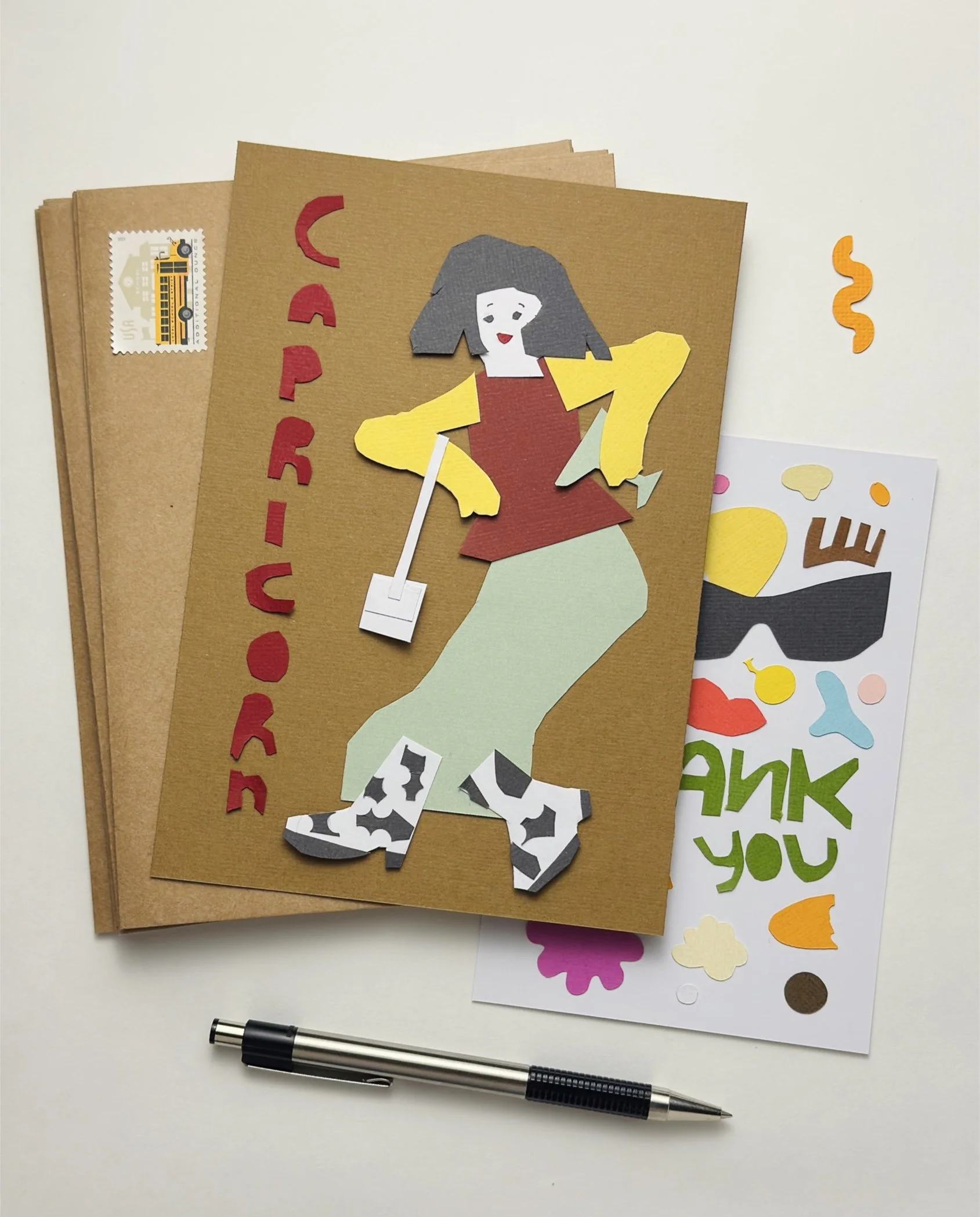 Shipping mail of Capricorn paper collage showing layered hand-cut paper