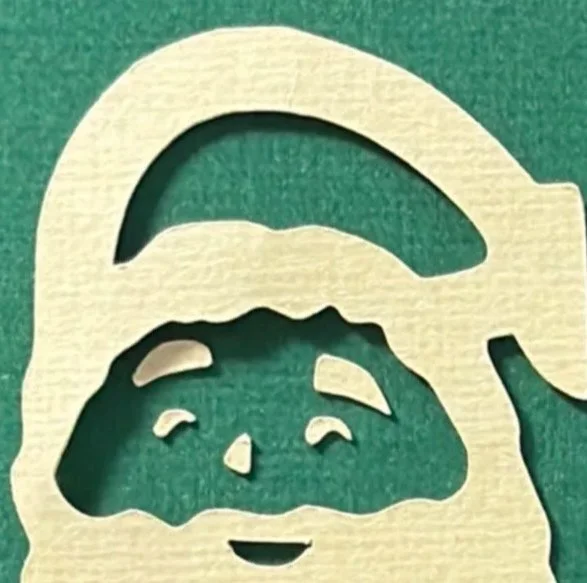 Hand-cut paper collage artwork by contemporary paper artist, featuring minimalist compositions made from layered colored paper