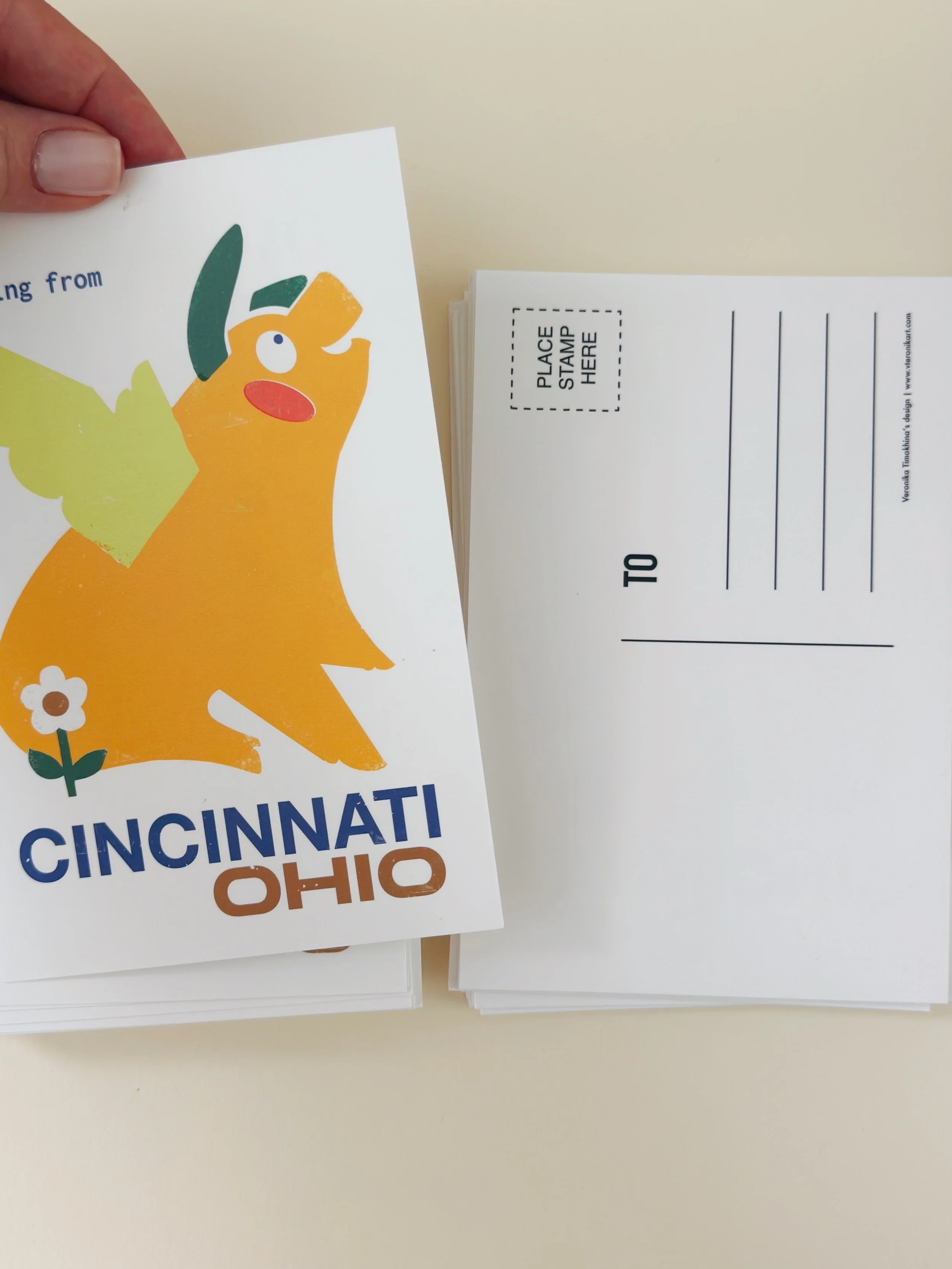 Flying Pig Cincinnati greeting card with kraft envelope on a beige background