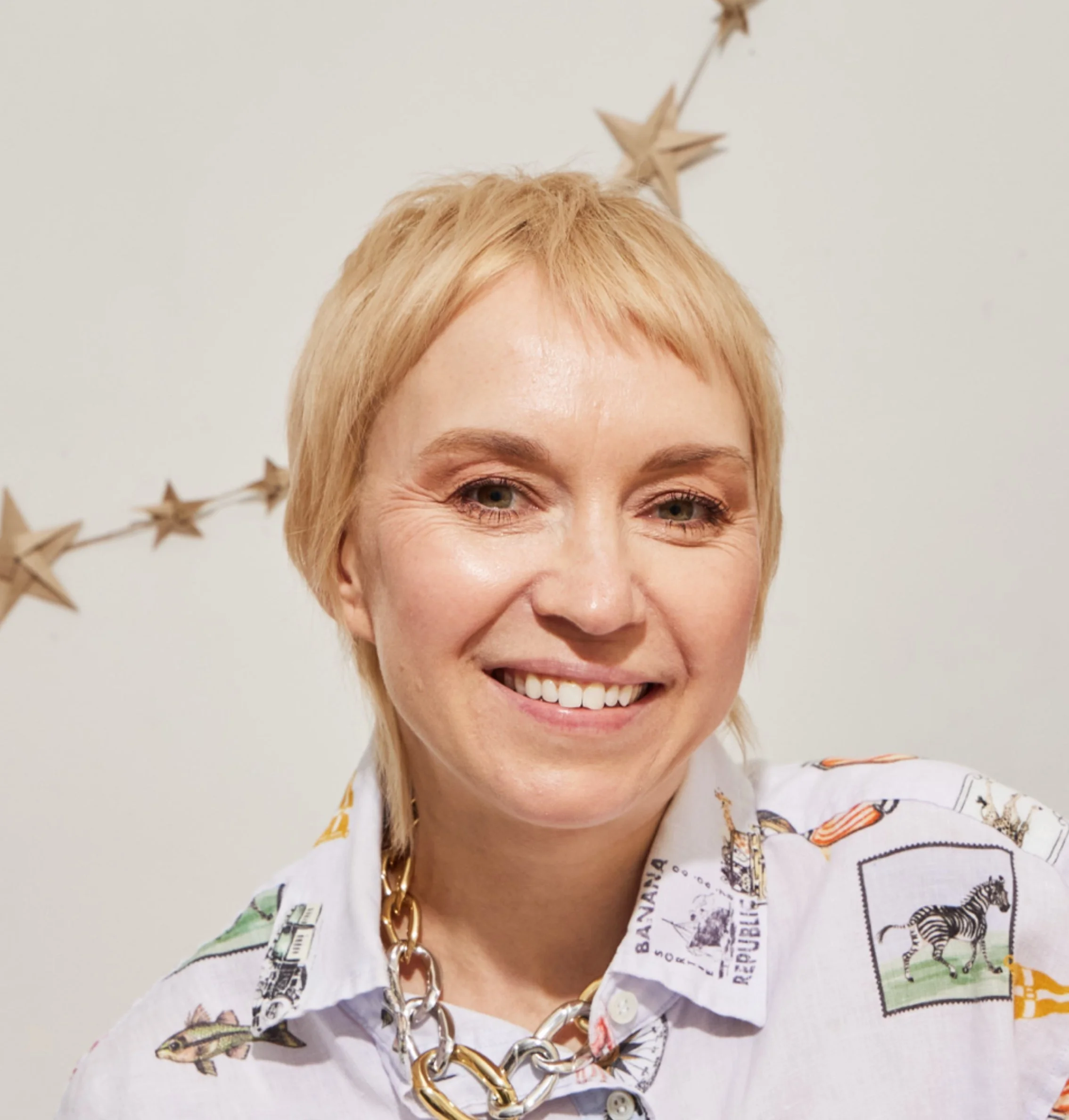 Hand-cut paper collage illustration by Veronika Timokhina, colorful layered paper artwork