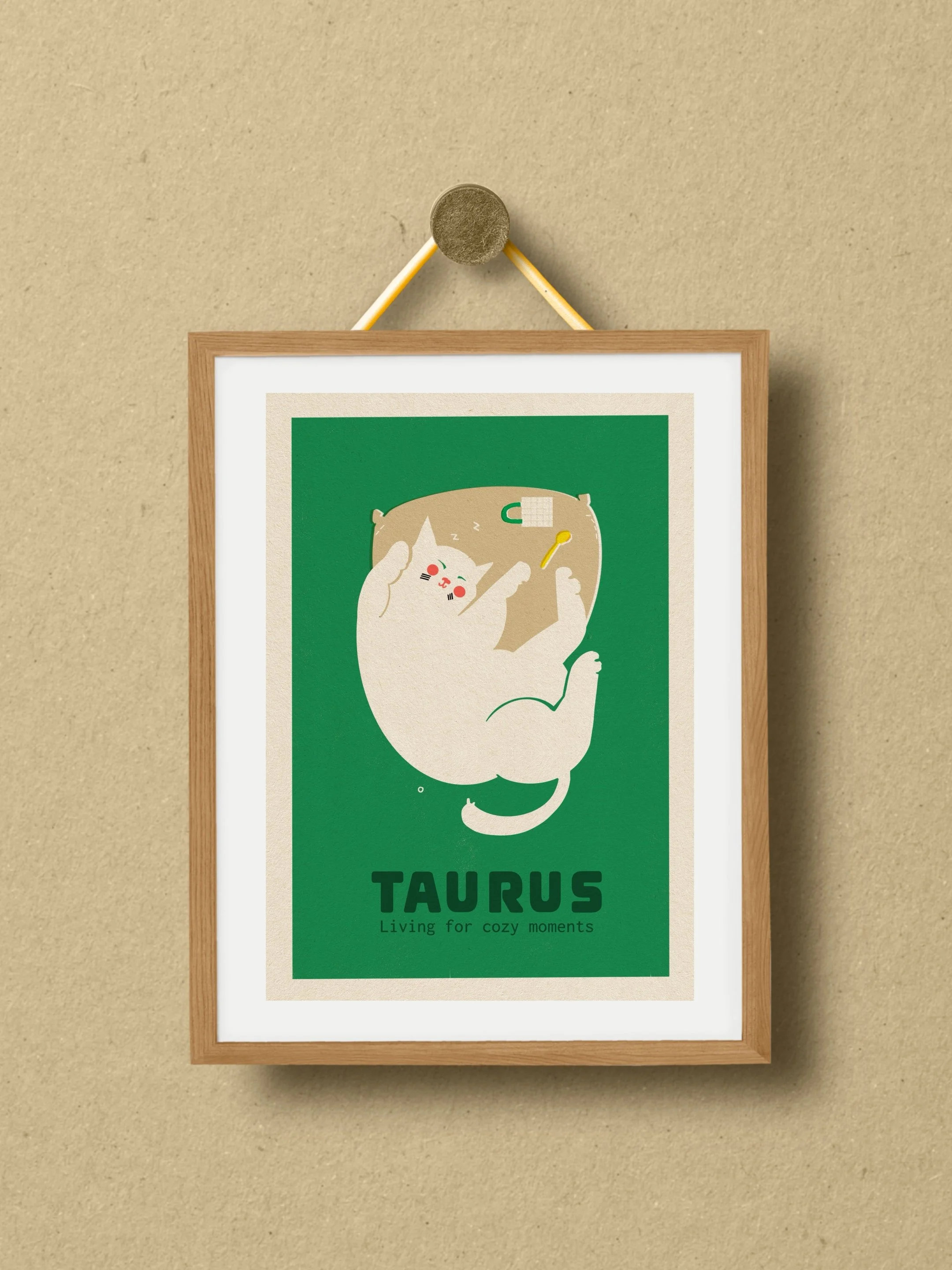 Taurus zodiac art print: white cat lounging with a pillow on green background. Text: "Taurus Living for cozy moments." By Vteronikart