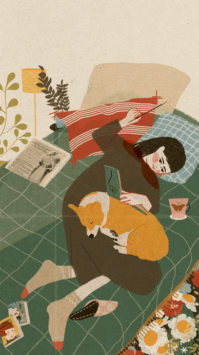 A person with short dark hair and glasses lying on a bed, wearing a red and black striped sweater, holding a green book, with a pig-like dog curled on their lap, surrounded by a plant, lamp, open magazine, cup, slippers, and a blanket with a floral pattern.
