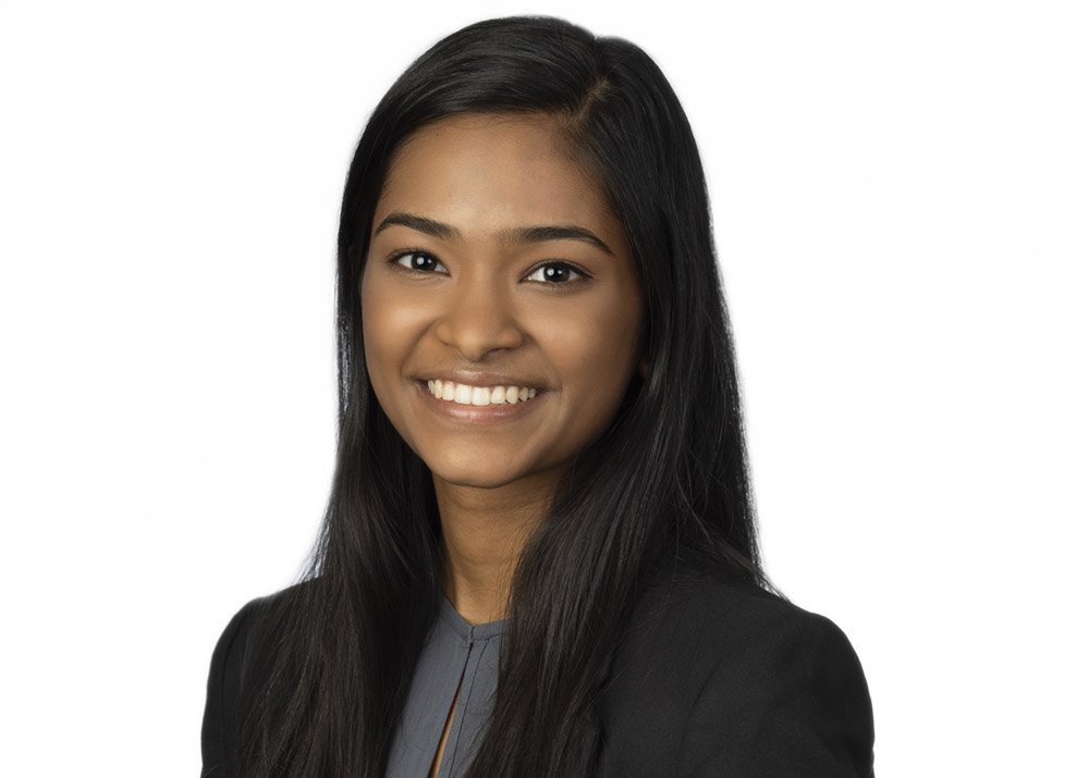 Chicago executive headshots on white background of an attorney. This shows a  professional business woman with a high-end upscale look for corporate branding.
