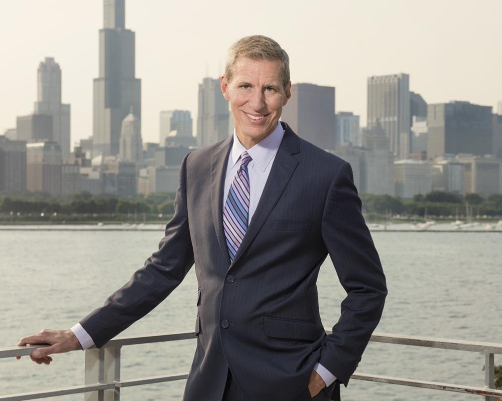 Executive portrait with the skyline of the museum president by a professional photographer chicago. The museum was doing a press release and needed a photo of their president. This will also be used for future annual reports. 
