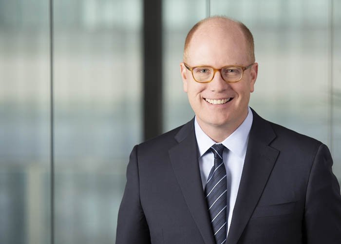 Headshot with a blurred background of a Chicago CEO