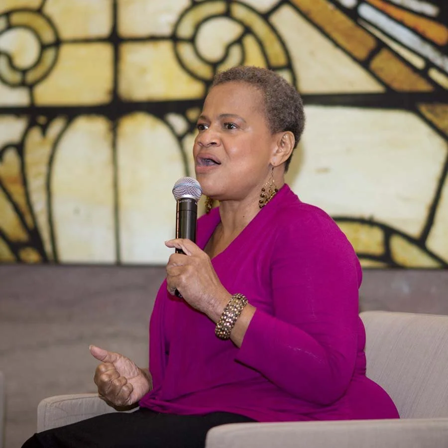 A speaker at a multiple day conference at a hotel in Chicago taken by an event photographer for a corporate client.