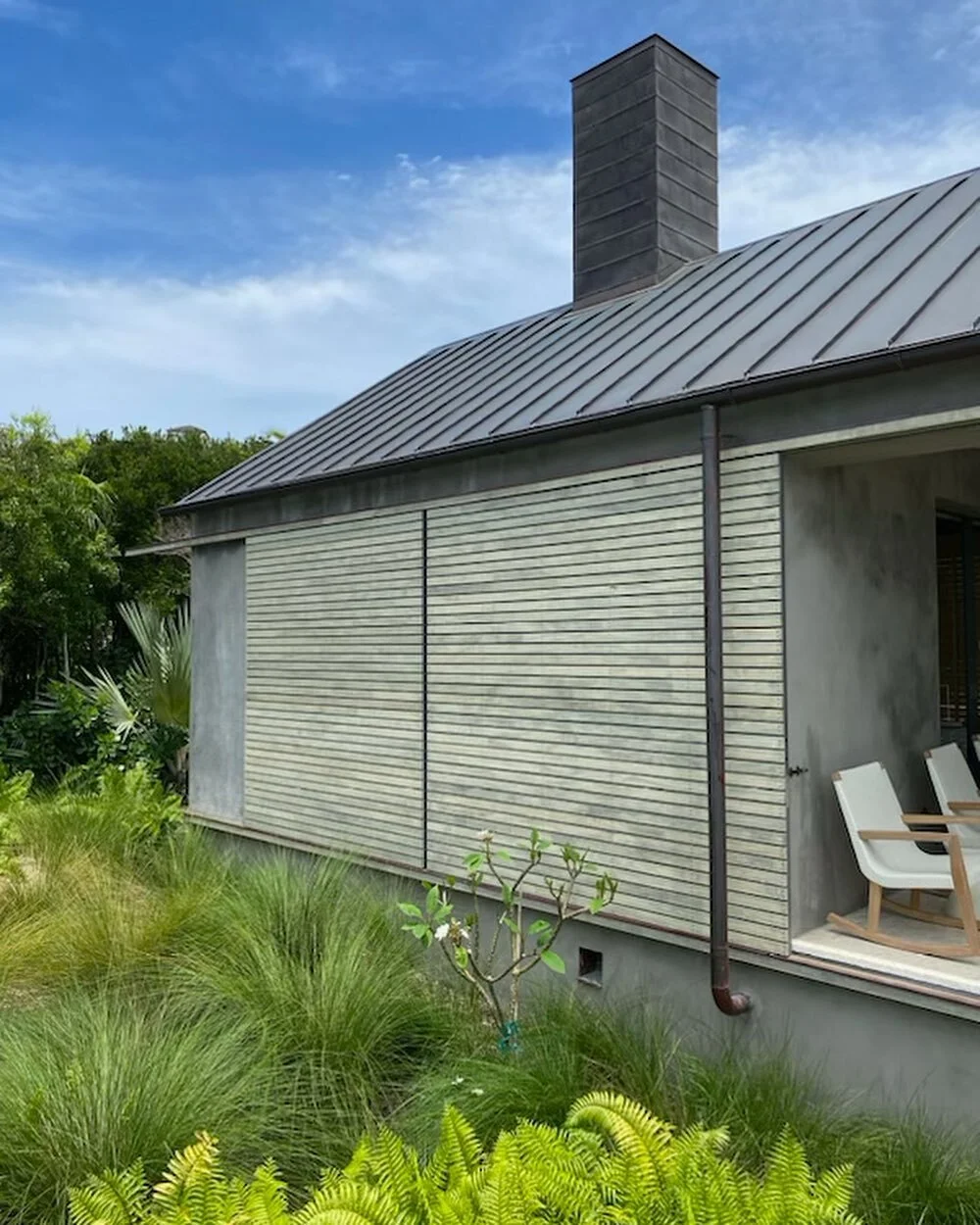 Aluminum rolling screen frames installed and clad down on this residential build in the Bahamas designed by Max Levy Architects.  Little bummed we didn’t get to install these personally but excited to see them in. #fabrication #architecture #al