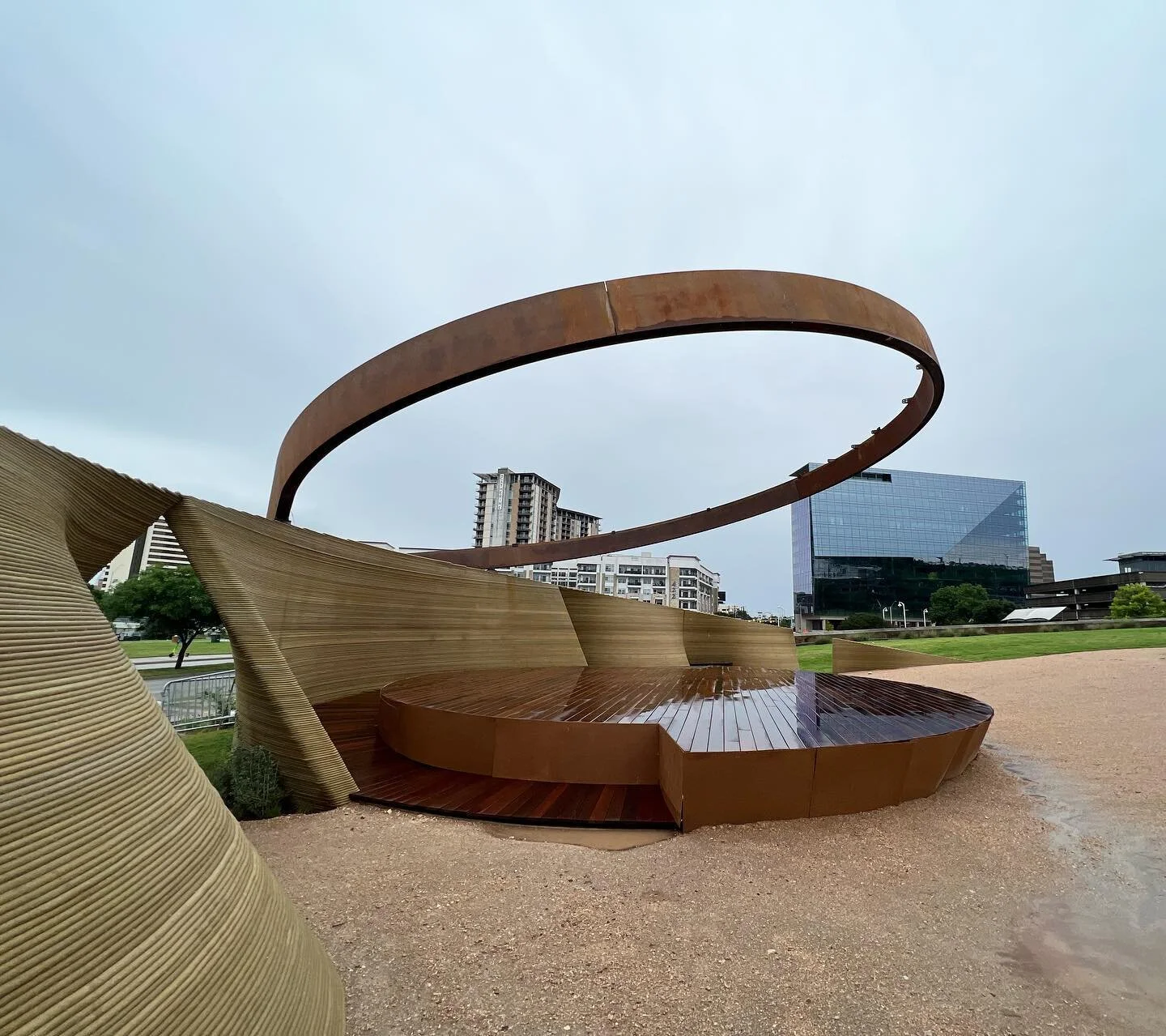 Saturday showers down at the new stage at the Long Center.  Some work left to go but a quiet afternoon and no construction fencing makes for better shots of the halo over the stage and 3d printed wall. Collaboration between @icon3dtech , @bjarkeingel