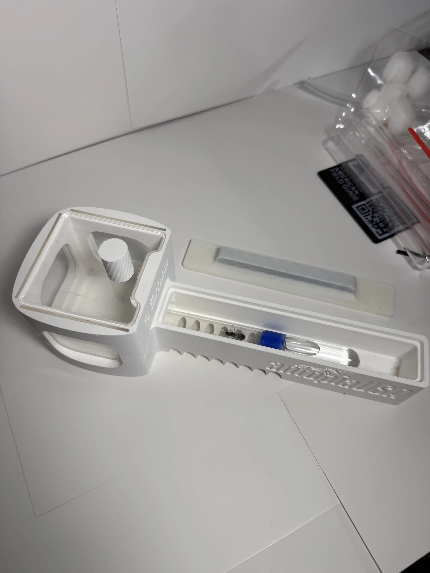 Test Tube Cabin Portal V5 nest with a test tube seated, clear lid and 270-degree viewing window