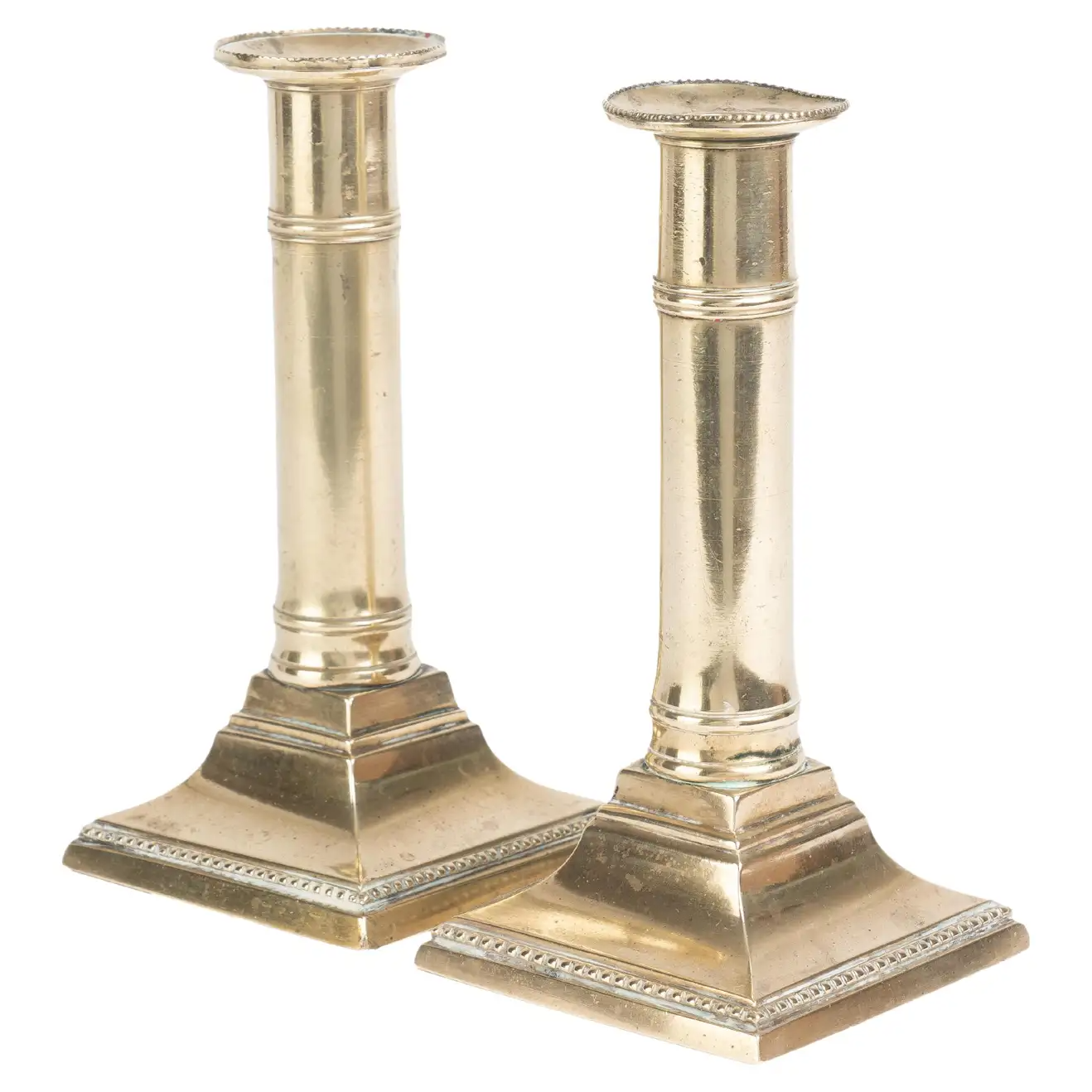 Pair of English Cast Brass Columnar Candle Sticks on a Square Base, 1810
