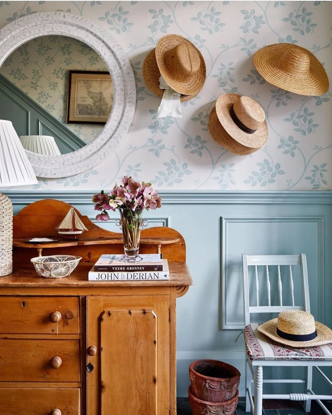 Sun hats as wall decor in hallway design by Lilse Mckenna