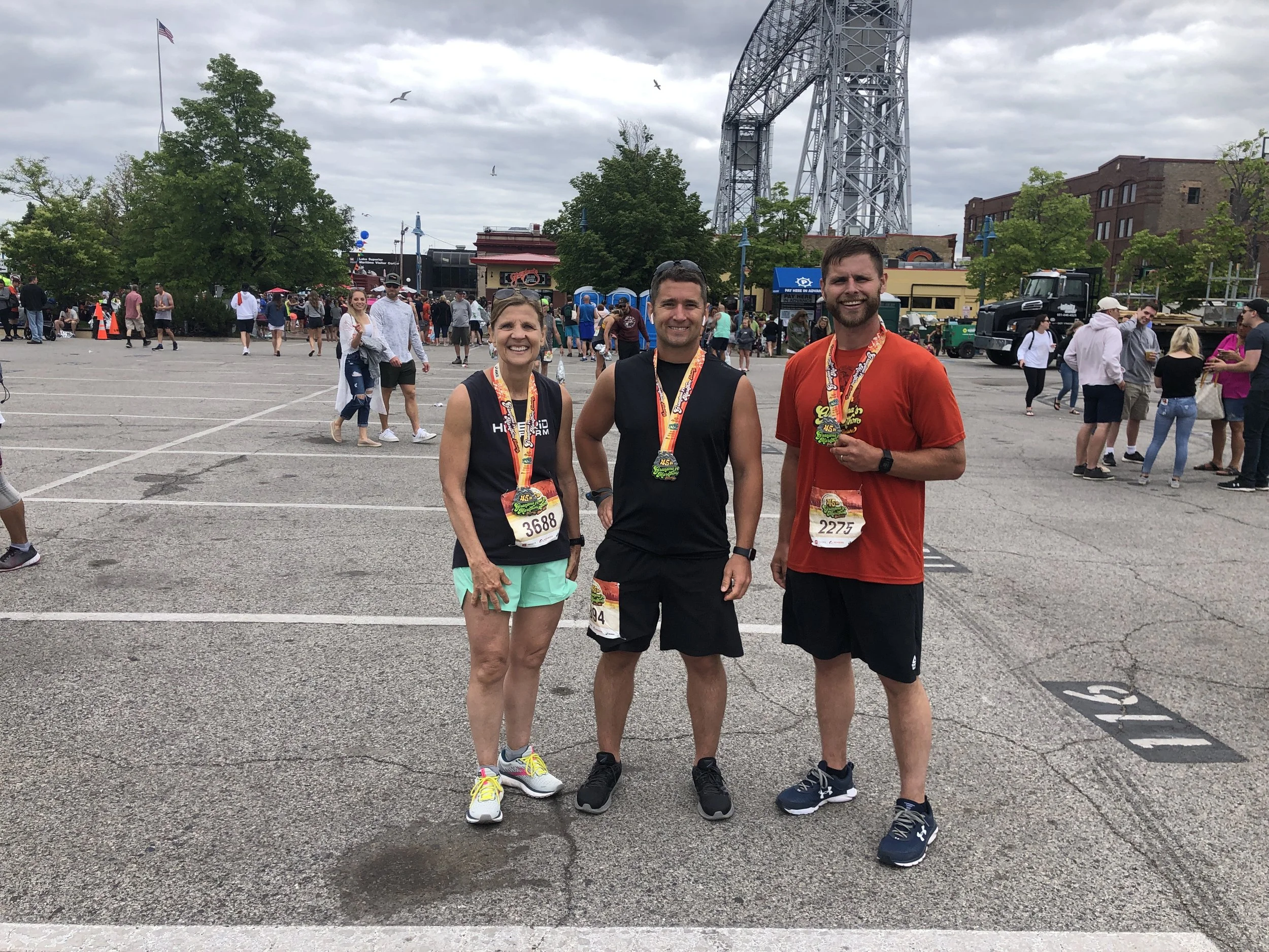 Dona at Grandma's Marathon Finish with fellow HybridX members.