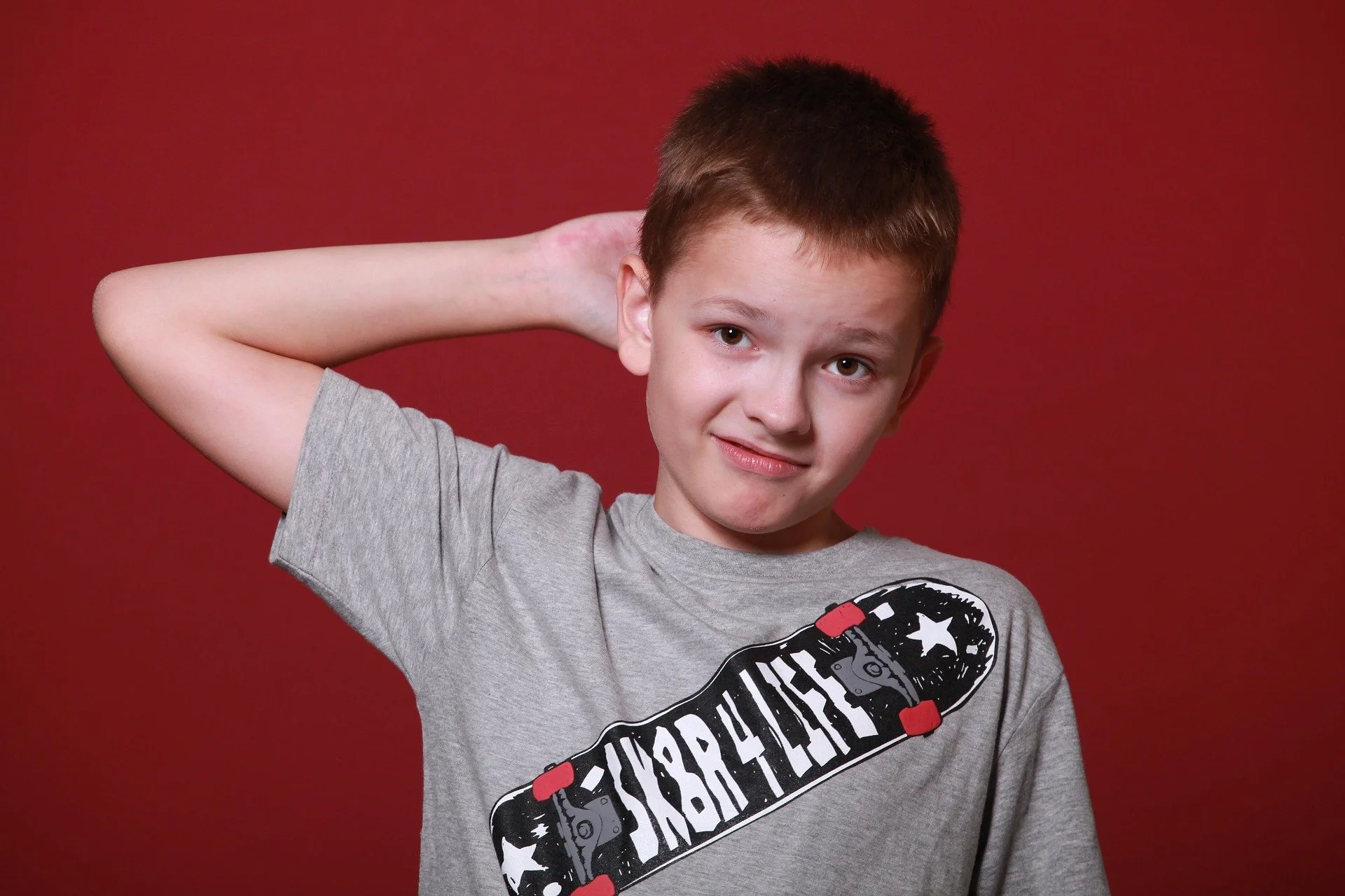 young boy confused look