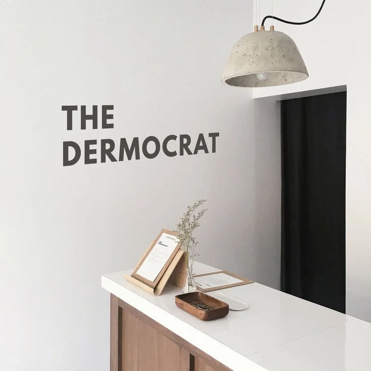 the dermocrat logo signage