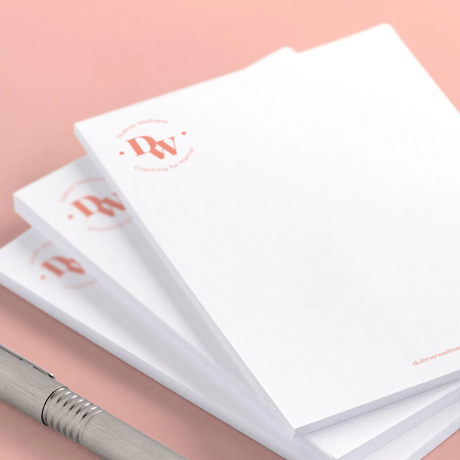 dubner wellness memopads pink logo on notepads