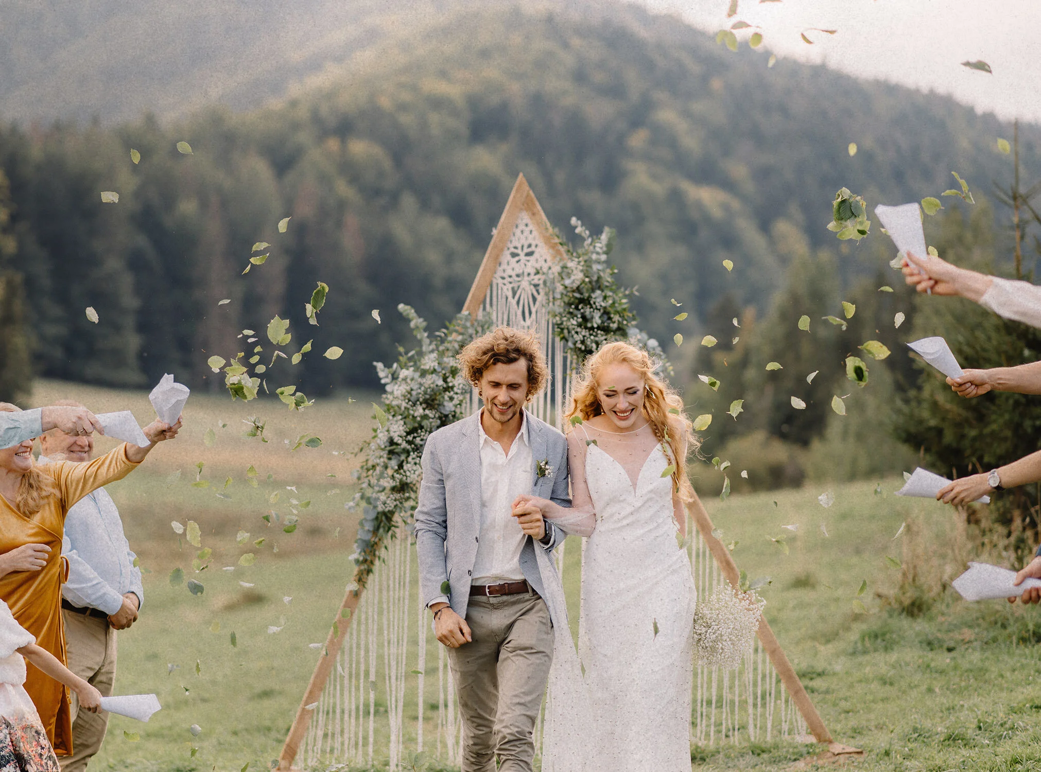 Laurie’s customers, Larissa and Emmett, just married walking off the aisle together.