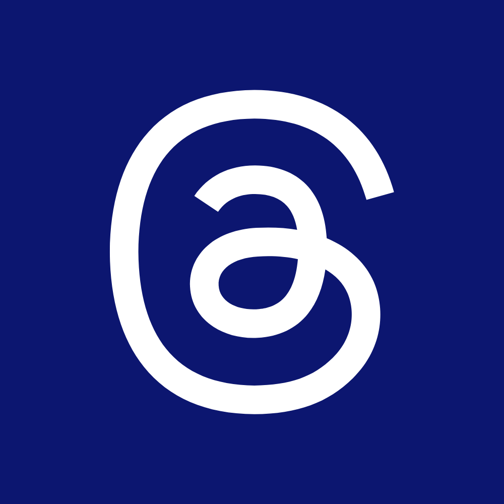 The logo of the Associated Press (AP) featuring a white lowercase 'a' and 'p' intertwining inside a circle on a dark blue background.
