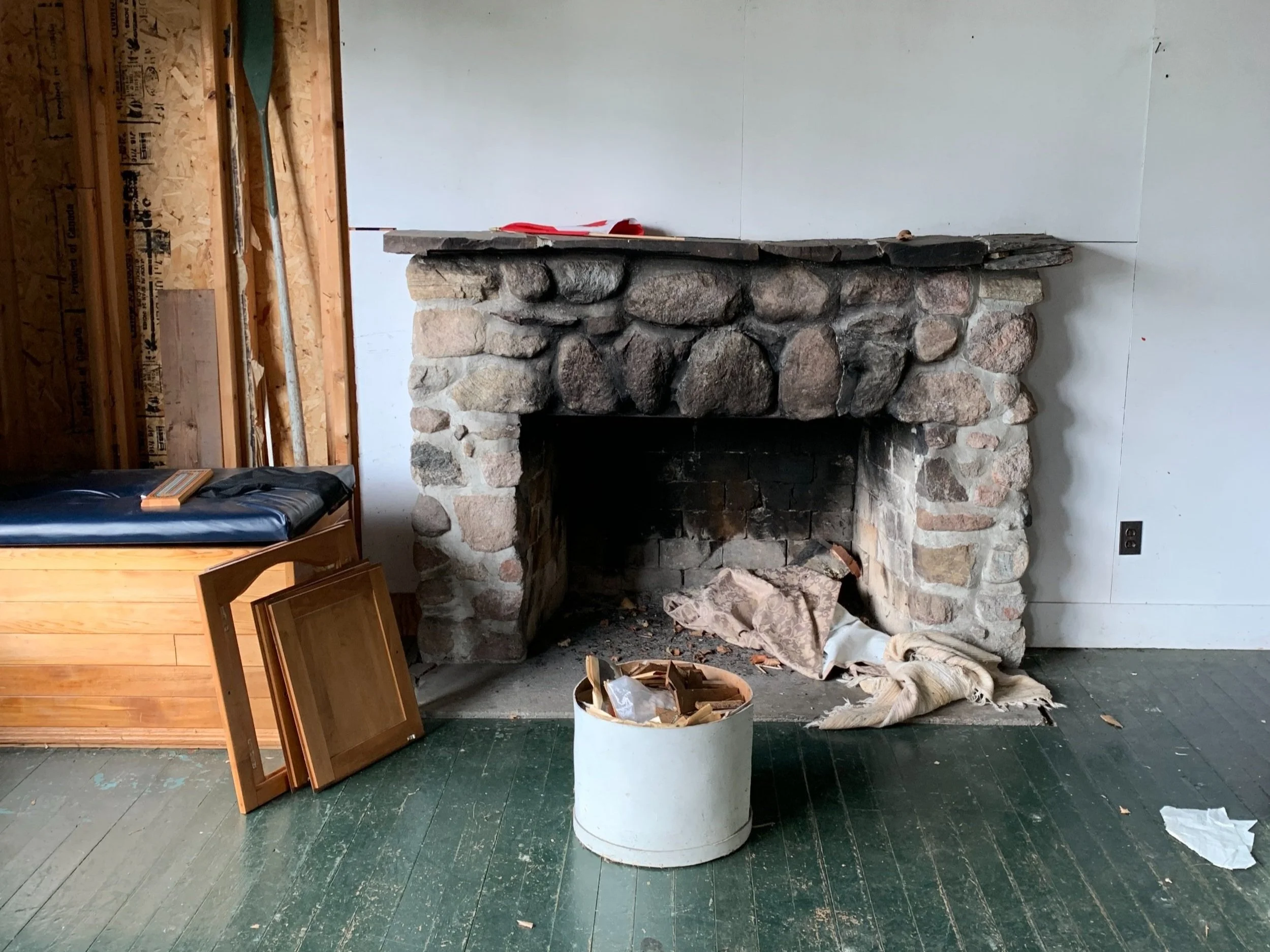 A masonry fireplace being repurposed