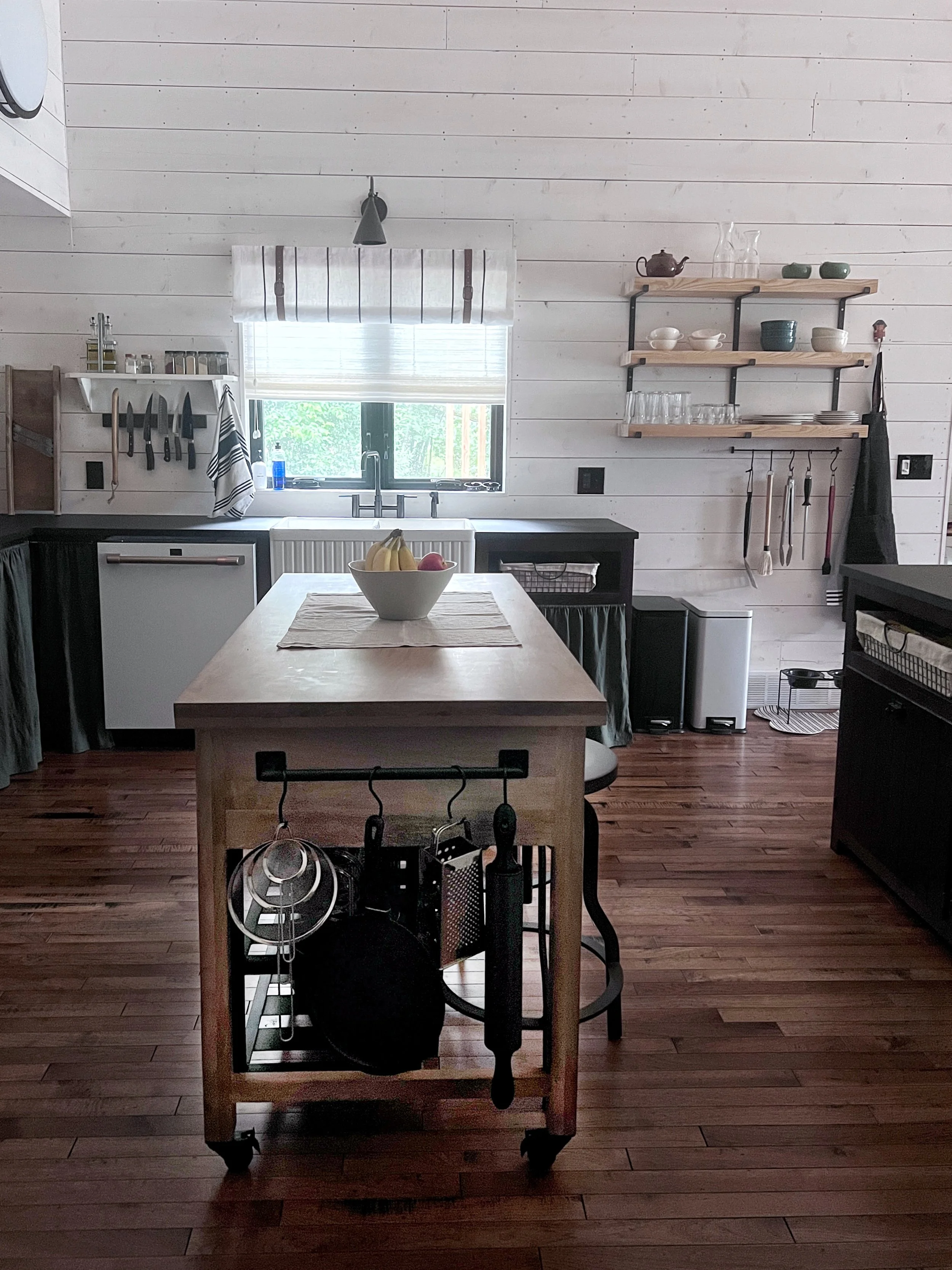 a cottage kitchen island with vintage design and antique accents