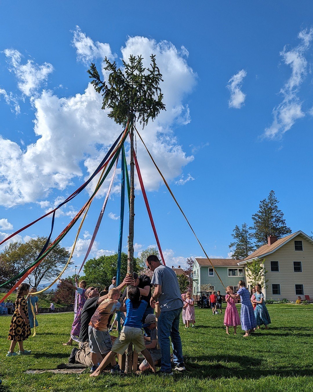 It wasn't the biggest Maypole this year but it was the perfect size for the first and second grade children to put up with their dads and dance around. Everyone at Woodcrest got together to observe the occasion and celebrate the incredible weather!