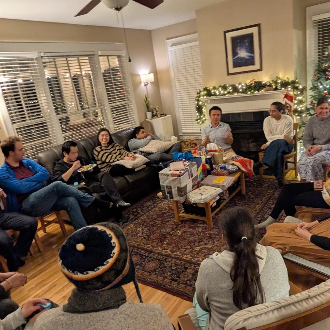 Celebrating the Christmas season together with neighbors and friends at the Durham community house in North Carolina.