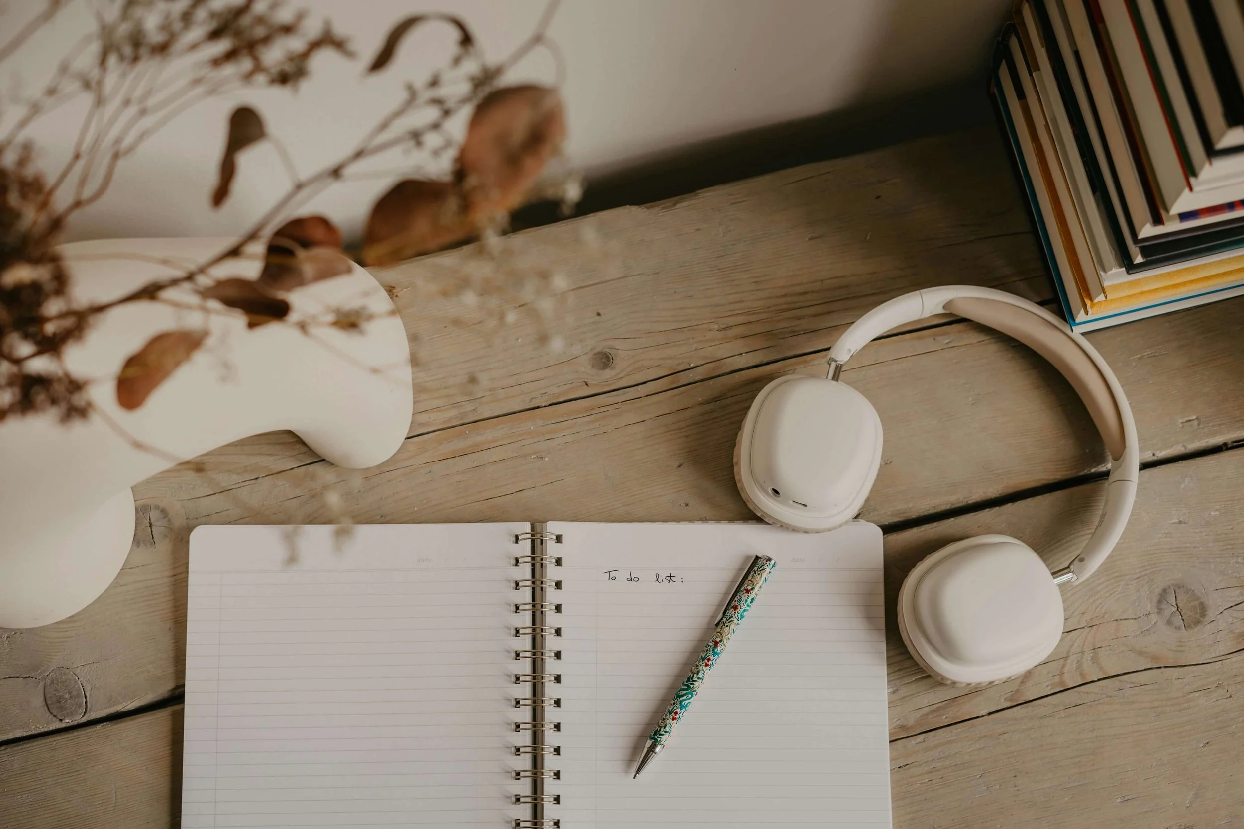 An open notebook sits on a desk