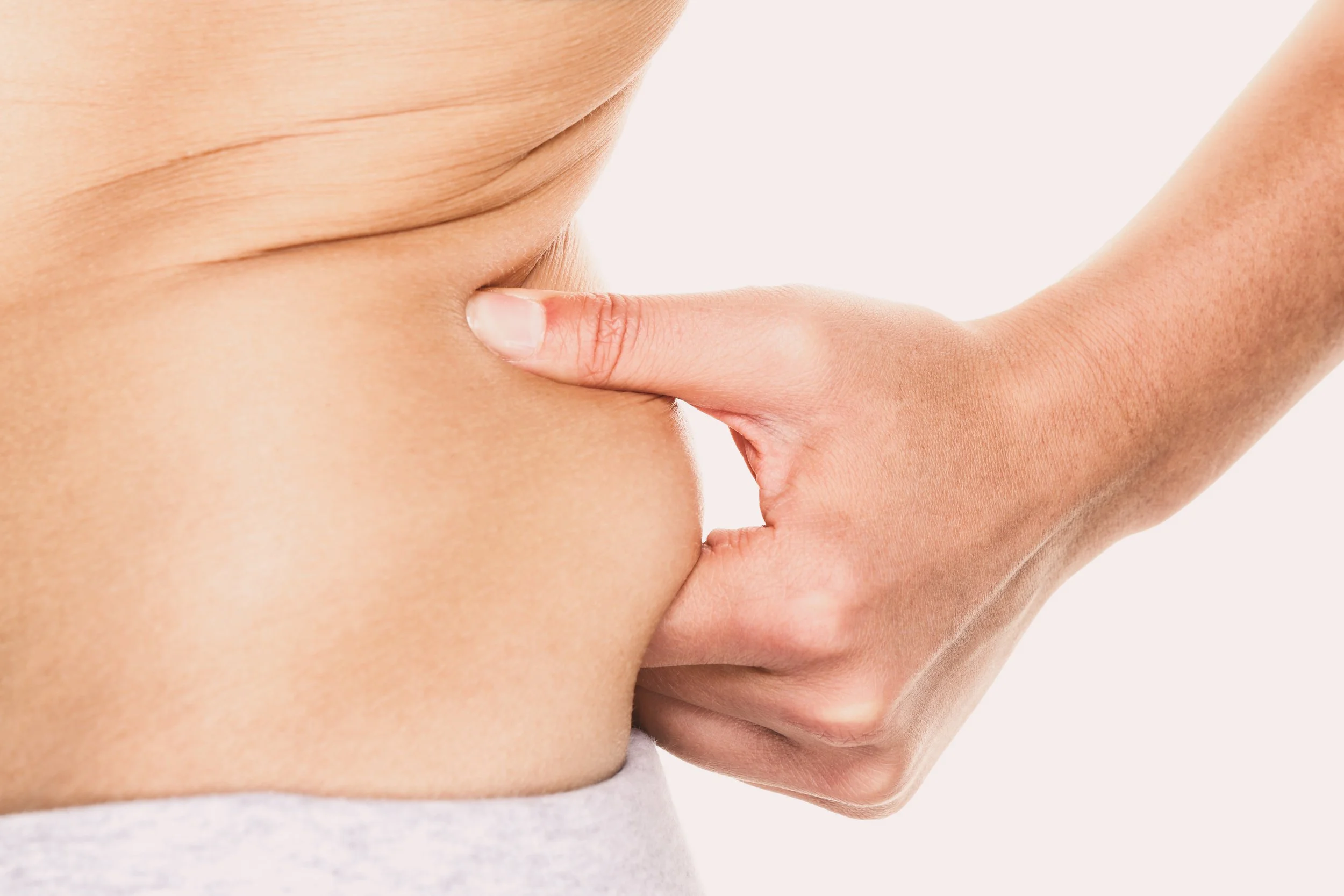 Waist area targeted for fat freezing treatment.