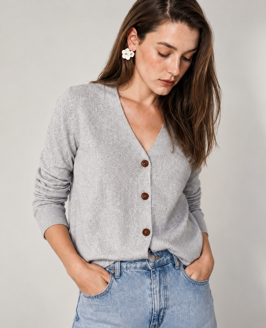 Pensive Woman in Gray Cardigan.png