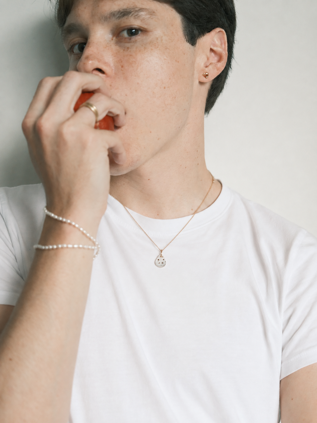 Freckled Portrait with Golden Jewelry.png