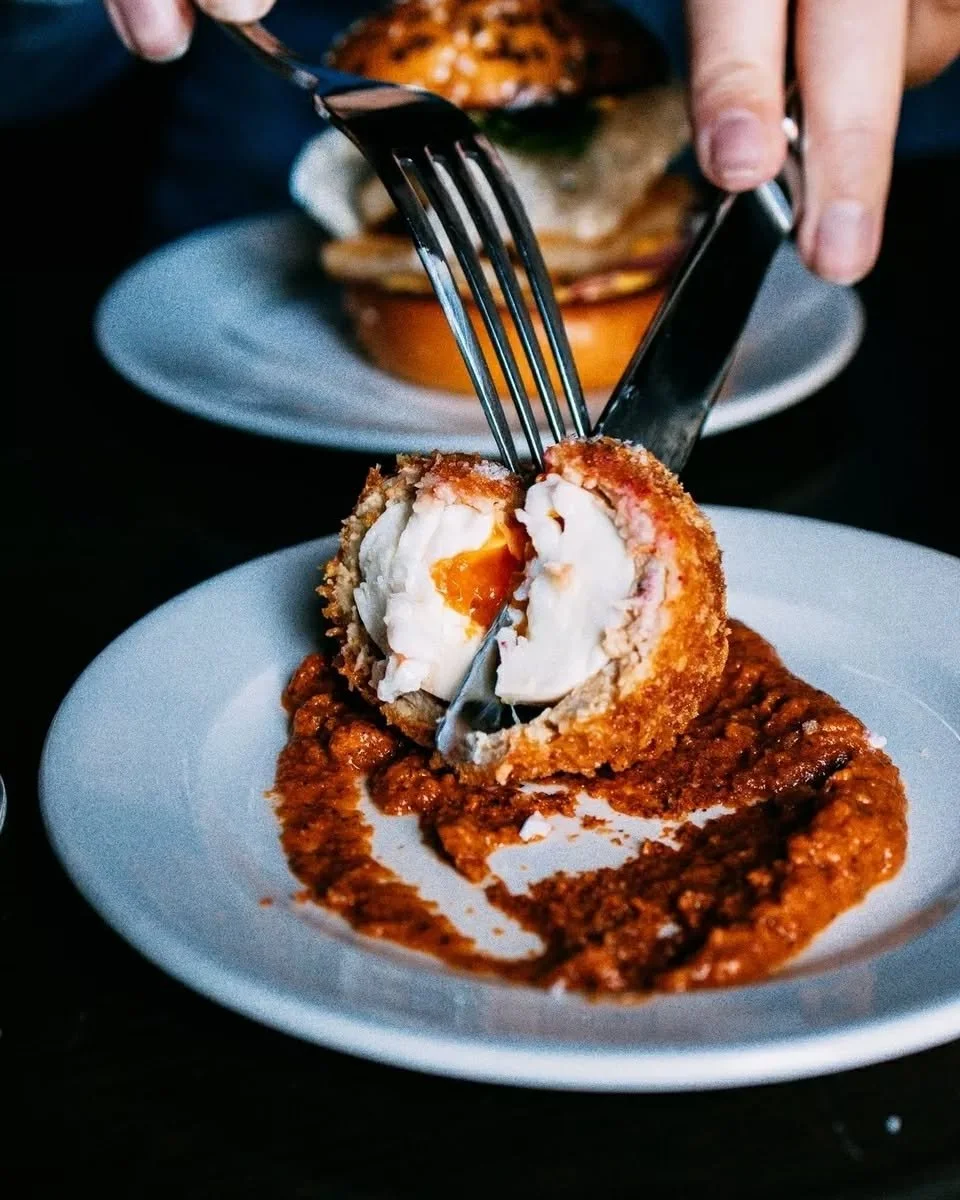 Pork Scotch Egg on a bed of romesco.

An cleansing St Andrew's Brewery Lager on the side.

It's a start, what's next.

The Bay Hotel. Reserve your table through the link in bio.