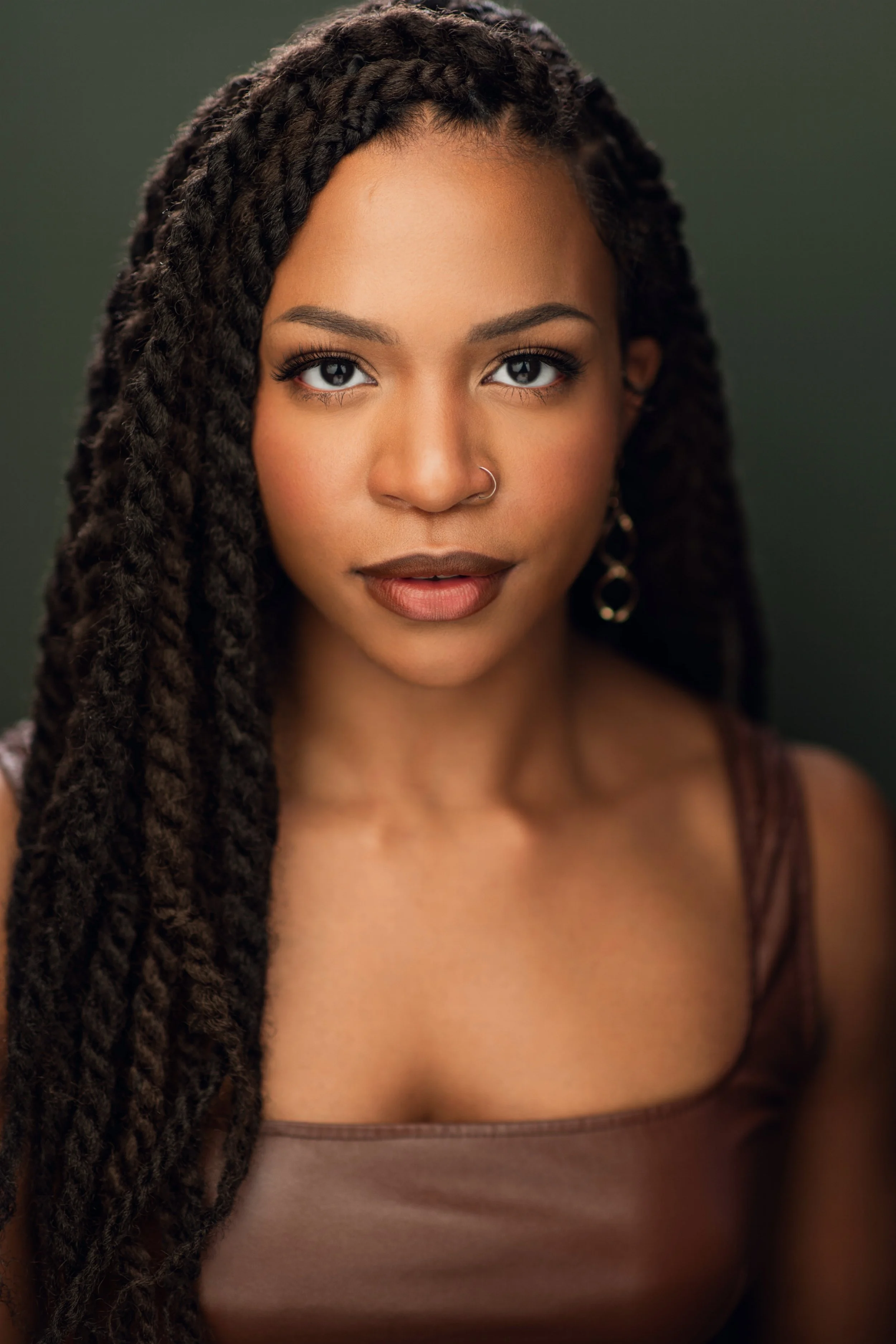 Arielle Roberts with braids twists locs