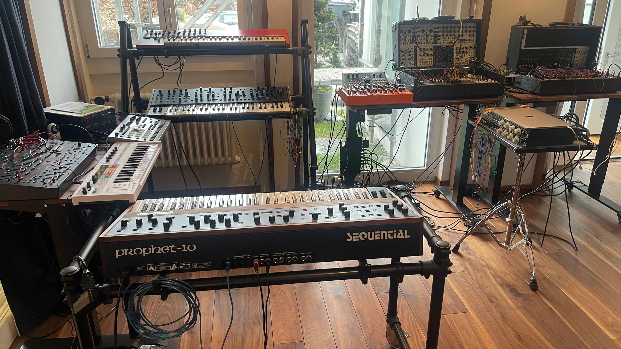 the synths are connected on two levels: audio out to the board, and in sync with each other