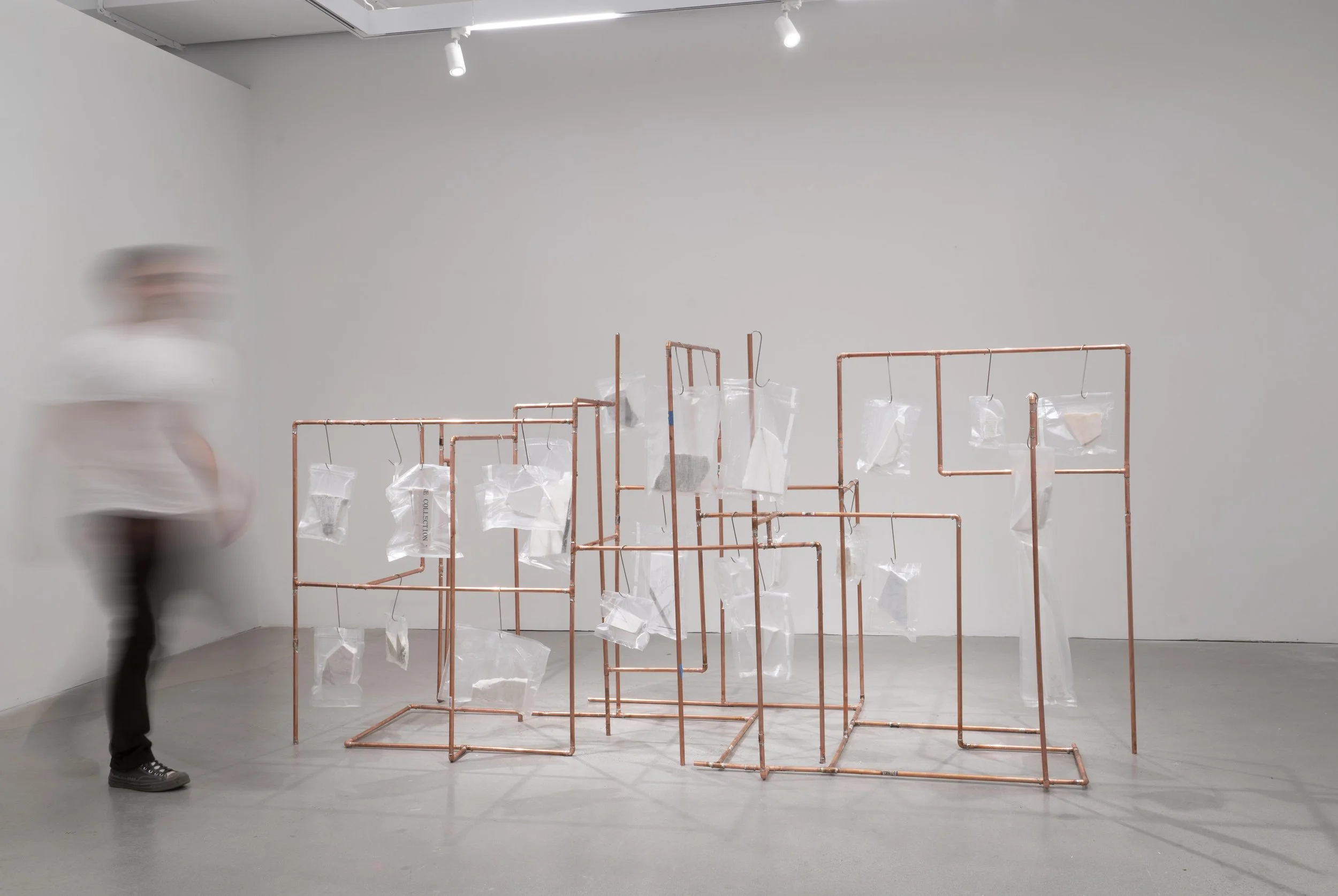 The Collection, 2026 (58 x 116 x 43_) copper, vacuum bags, butcher hooks, marble