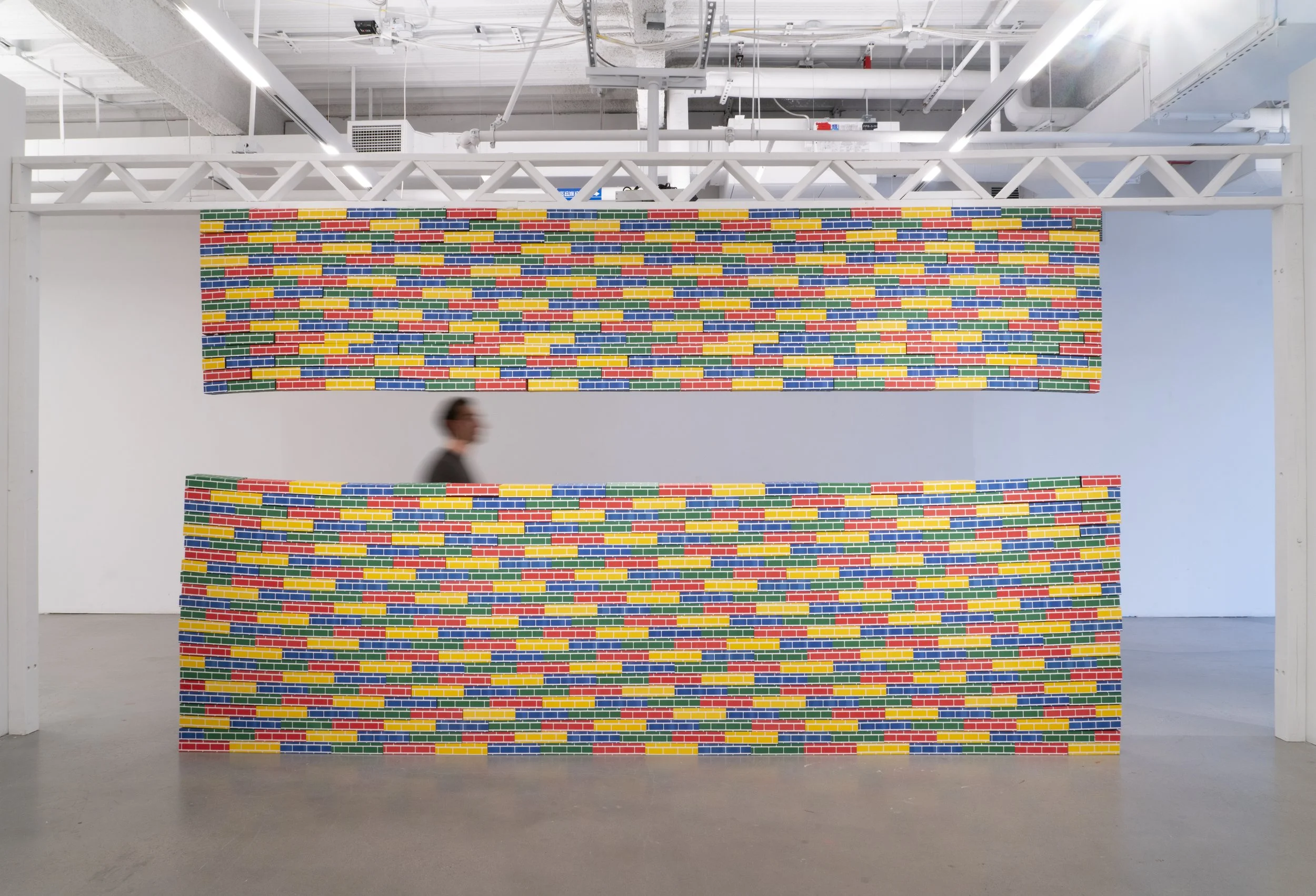 Enoument, 2025 (96 x 235 x 4”)
Toddler play bricks (cardboard)