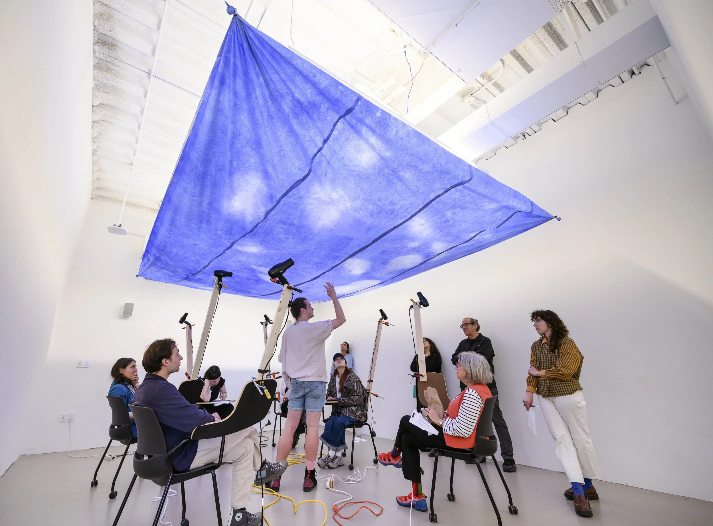 Hot air, 2026 (26 x 17’)
Muslin, thermochromatic pigment, acrylic medium, Herman Miller desk chairs, wood, clamps, hairdryers, extension cords, power strips