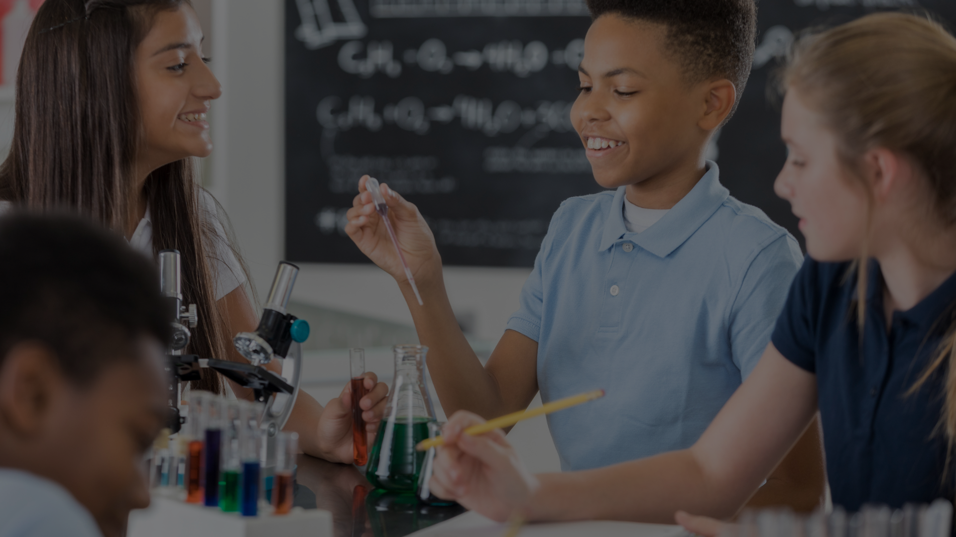 Underwater coral reef with various corals, sea fans, and small colorful fish swimming among the coral structures.