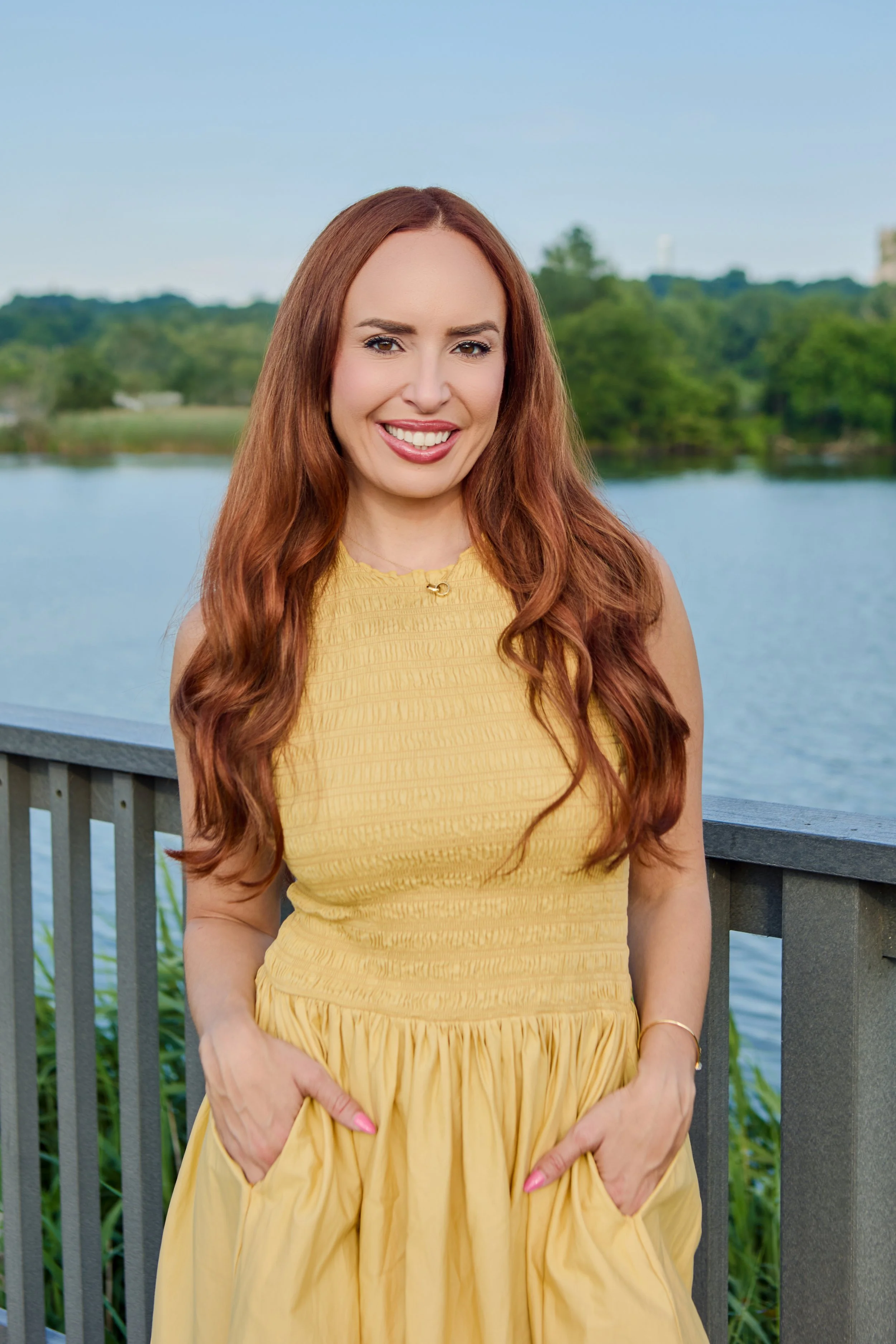 Dana Colthart, LCSW CEDS, founder of Clear Light Therapy, OCD and anxiety therapist in Bergen County NJ, smiling outdoors by the water