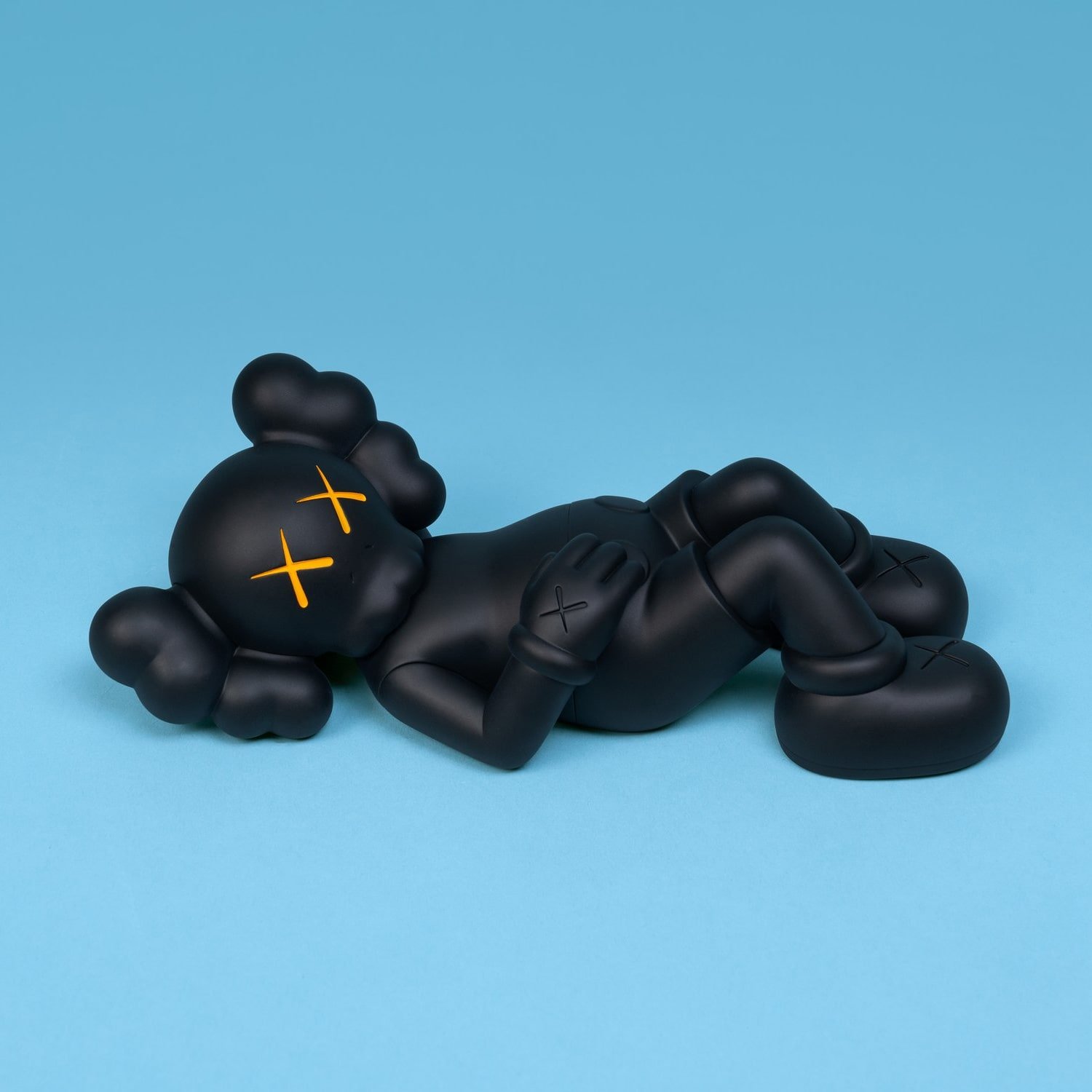 Holiday Japan black figure by Kaws from 2019 - Dope! Gallery