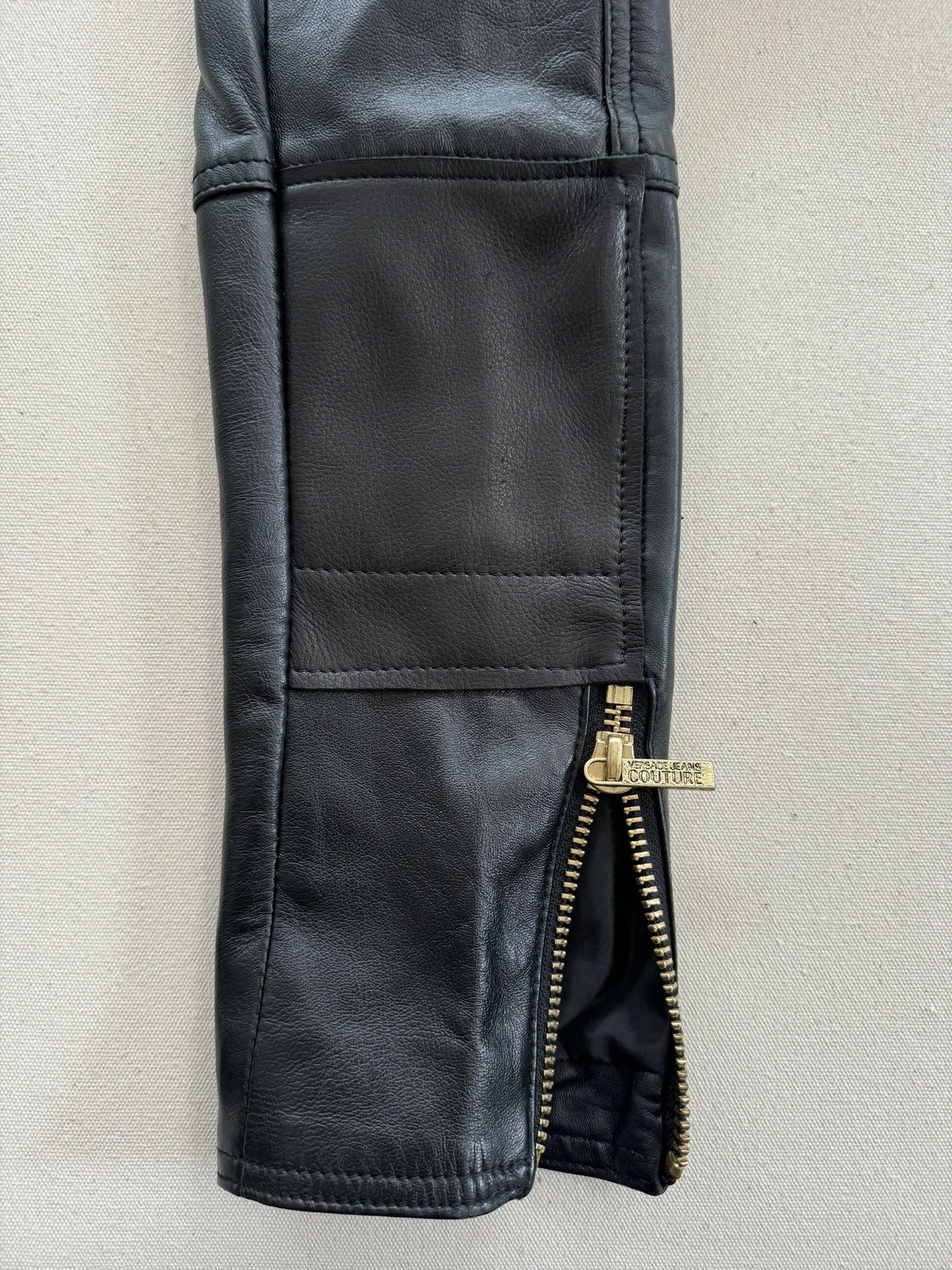 After_ Leather Jacket w_Large Tear.jpeg