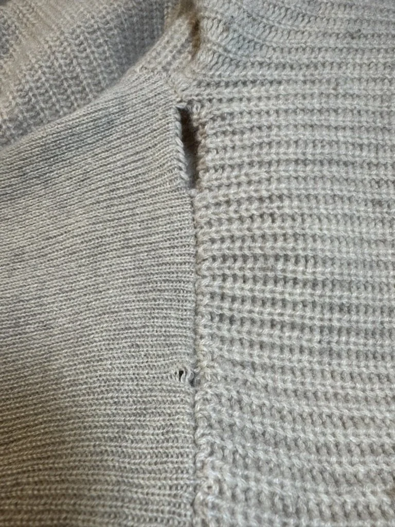 Before_ Sweater Seam to Cuff Holes & Run.jpeg