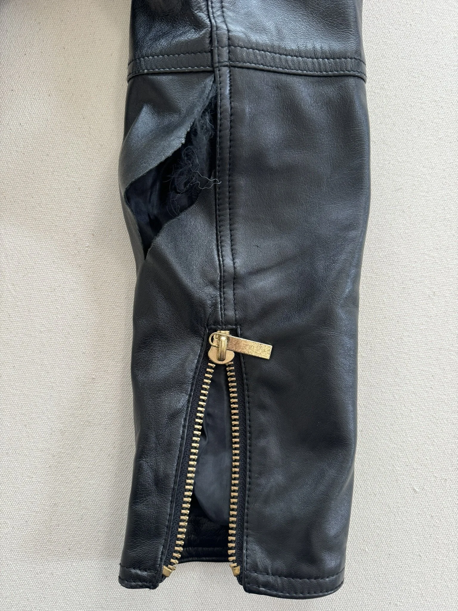 Before_ Leather Jacket w_Large Tear.jpeg