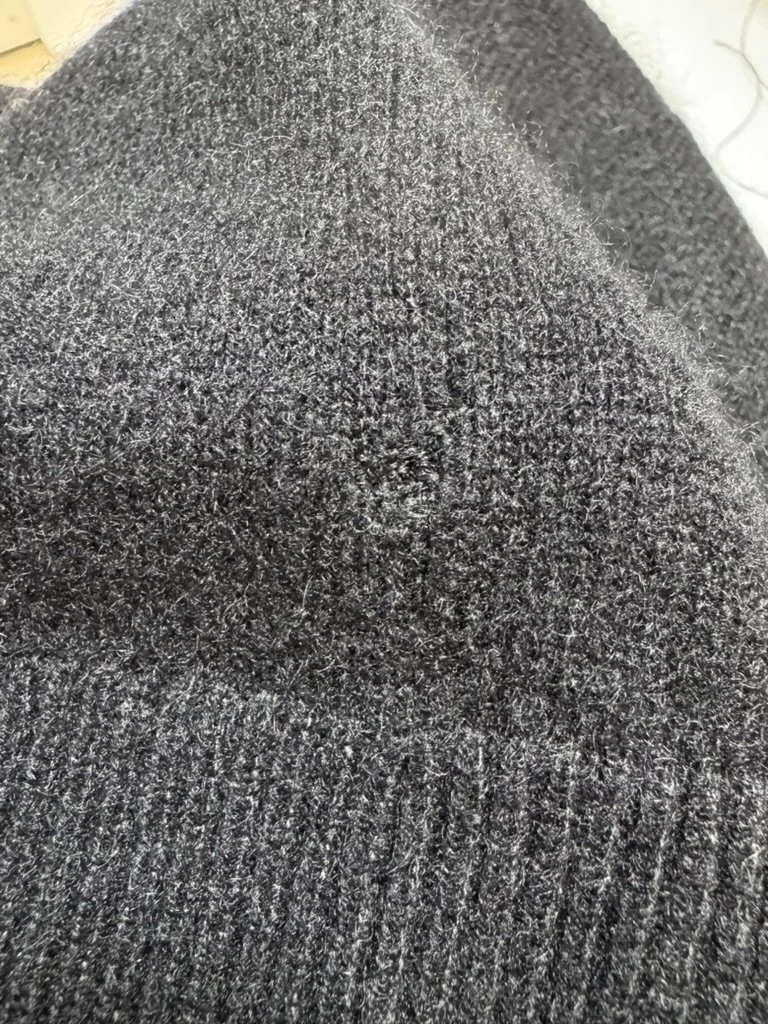 After_ Small Hole in Black Knit (No Harvest).jpeg