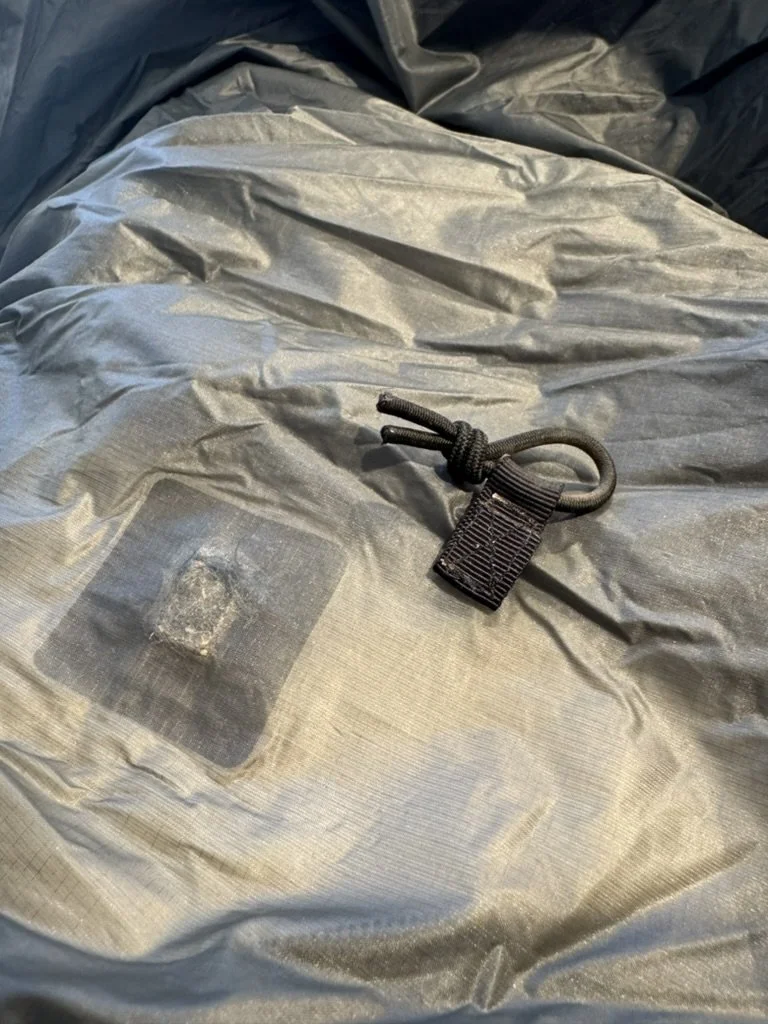 Before_ Tent Tab Torn Off.jpeg