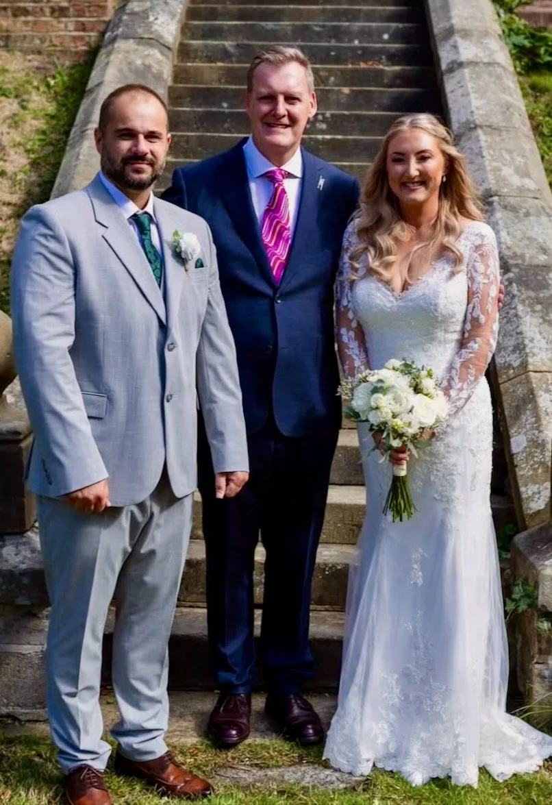 Gemma and Ed after their wedding, with celebrant David Moon