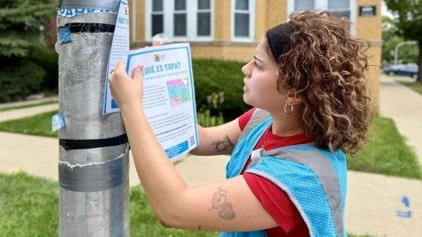 Students spread the word to strapped Chicago renters about their shot at buying in the neighborhood